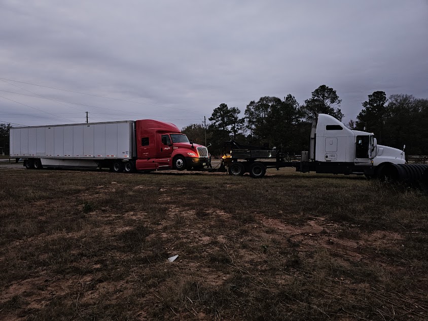 What is the law on towing vehicles in Georgia?